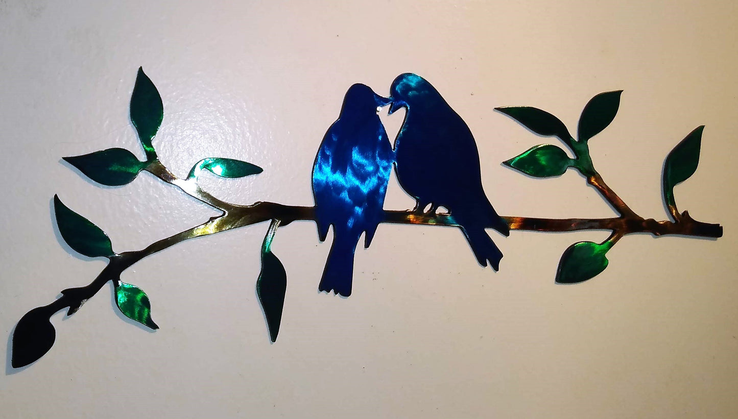 Blue Birds Sitting on a Twig